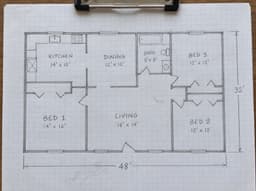 Photo of the hand-drawn floor plan sketch